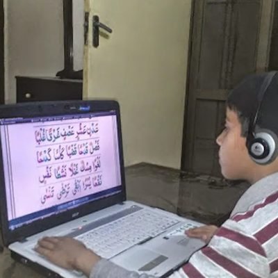 Student reading during a Quran lesson
